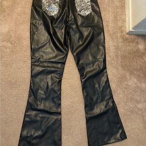 Chic Black Faux Leather Flared Pants with Silver Details